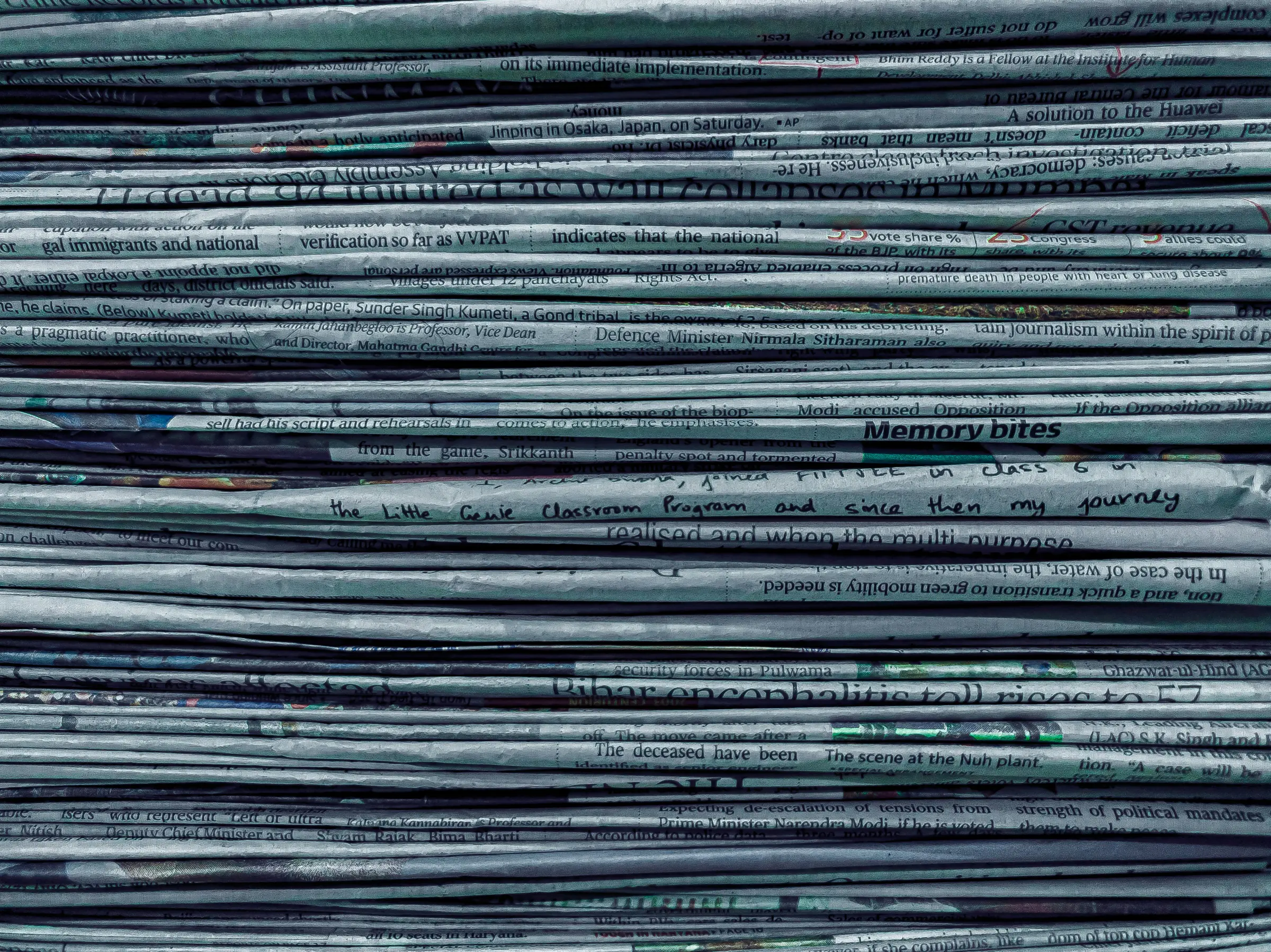 Stack of newspapers — Huntsville 3PL logistics news, supply chain articles, warehousing insights, and freight industry updates from North Alabama
