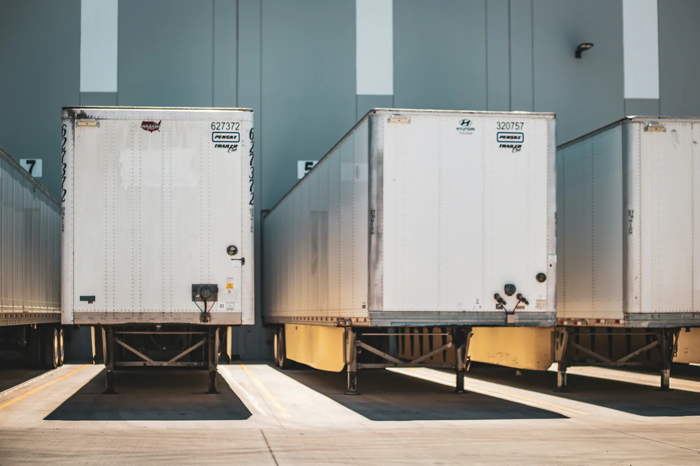 Cross-docking operation at a Huntsville, Alabama truck terminal — inbound-to-outbound freight transfers, LTL consolidation, and dock-to-dock handoffs for North Alabama logistics