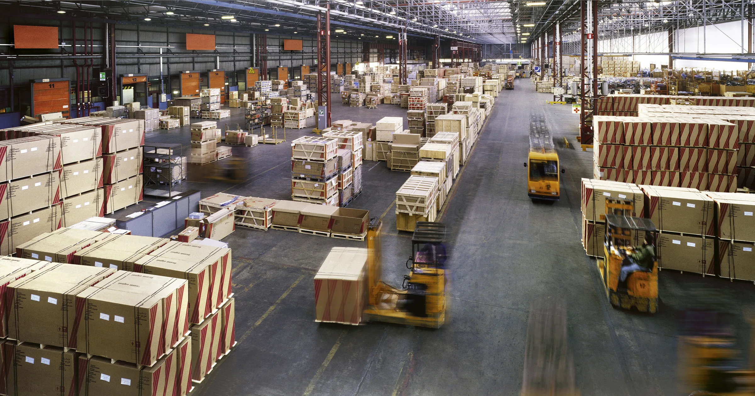 Huntsville 3PL warehouse operations floor — logistics services including warehousing, fulfillment & distribution, cross-docking, transloading, transportation & freight, kitting & assembly, returns processing, itar warehousing